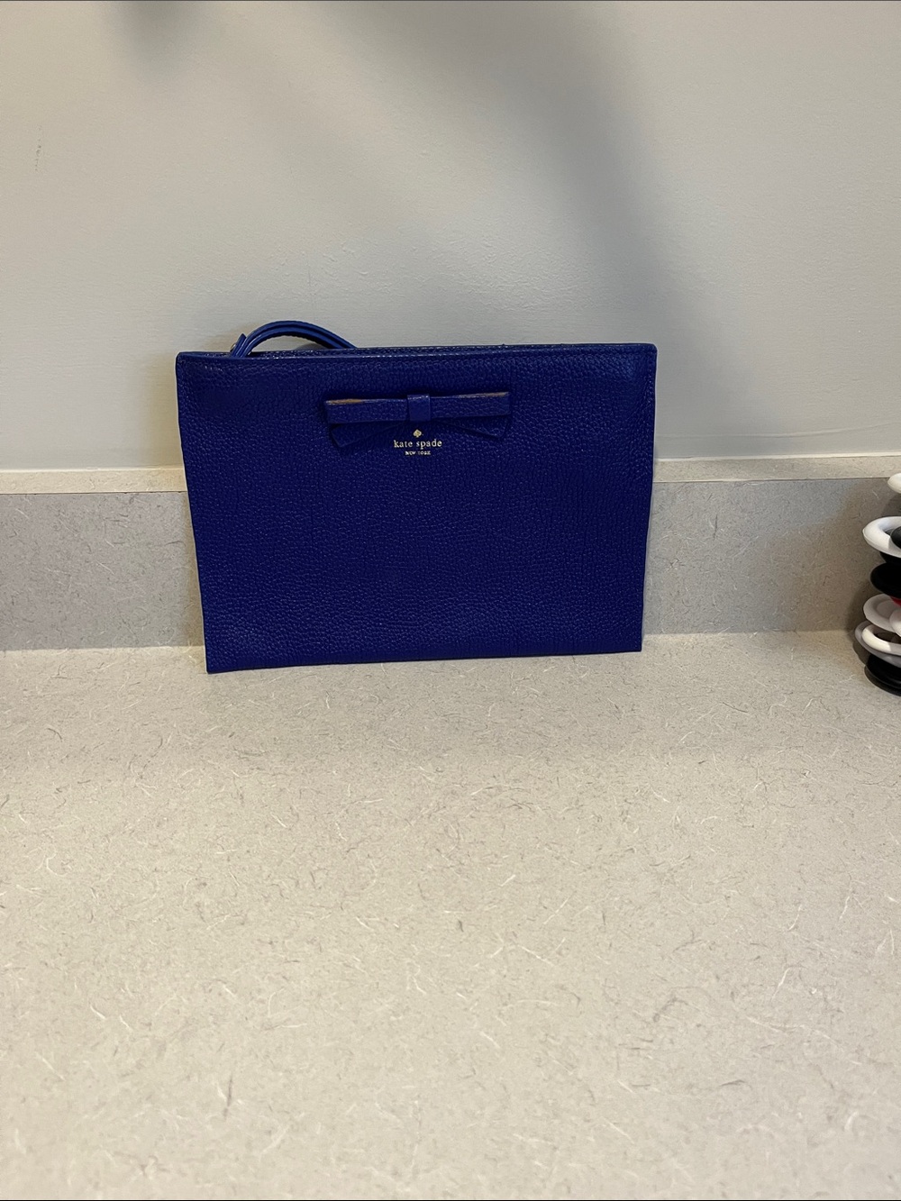 kate spade cobalt blue leather wristlet pouch with bow